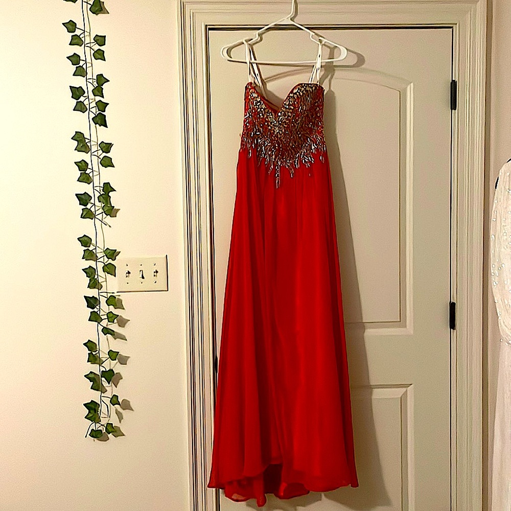 Red bedazzled top prom dress